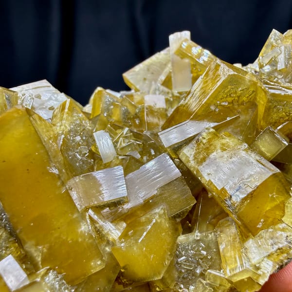 Block of golden baryte blades with purple fluorite from Jiangxi, China, top view
