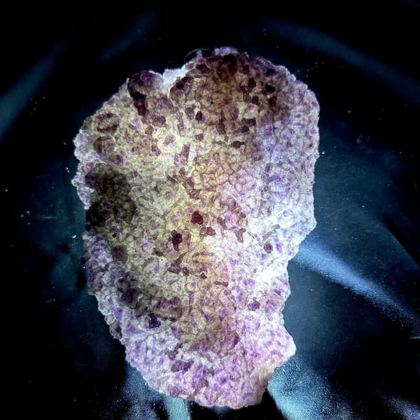 Translucent purple and green fluorite slab from Fujian, China, back-lit