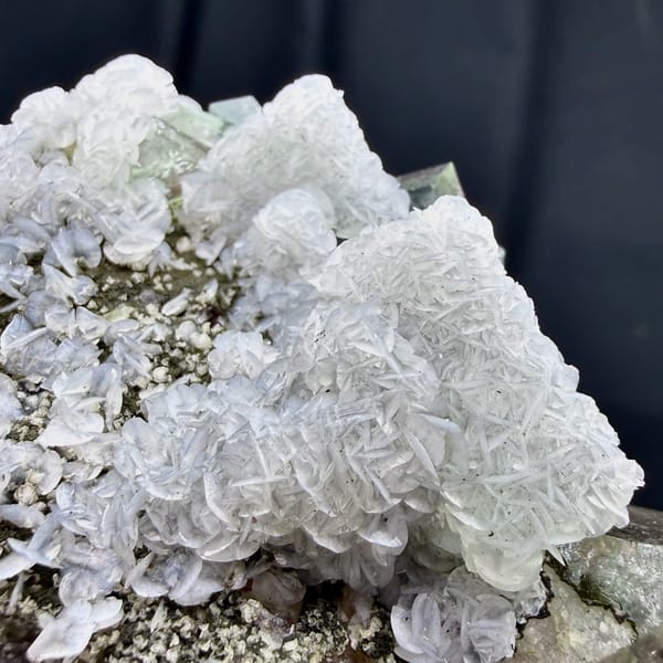 Pale purple phantom fluorite with pyrrhotite and calcite from Inner Mongolia, China, reverse side