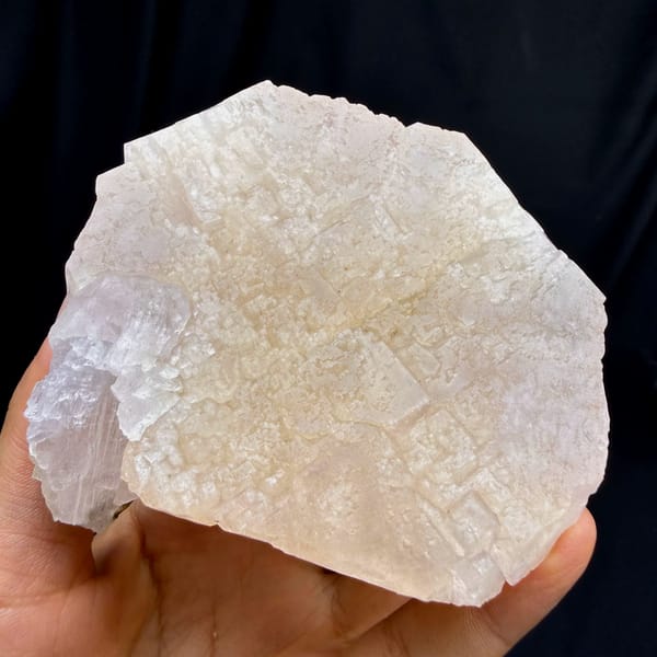 Large peach-pink apophyllite crystal with pearly face from Fujian, China, reverse side