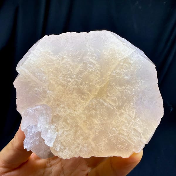 Large peach-pink apophyllite crystal with pearly face from Fujian, China, top view