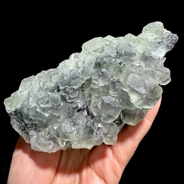 Mound of pale green stepped fluorite cubes from Fujian, China, second angle