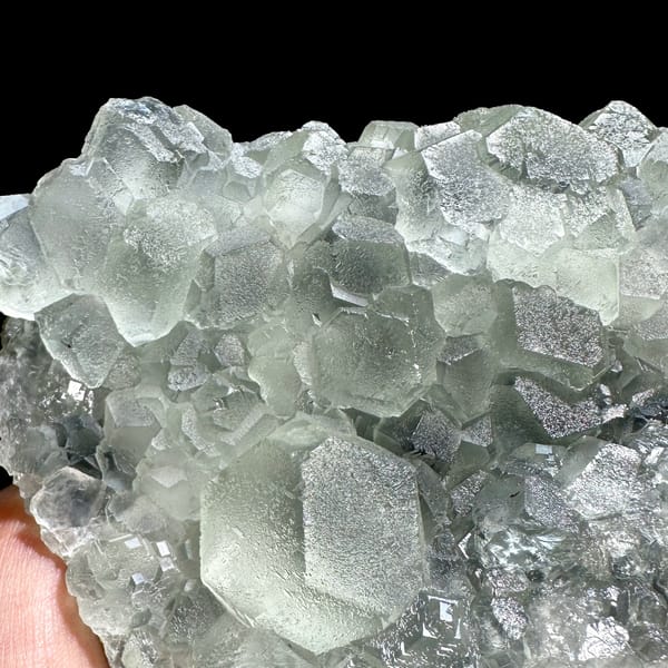 Mound of pale green stepped fluorite cubes from Fujian, China, reverse side