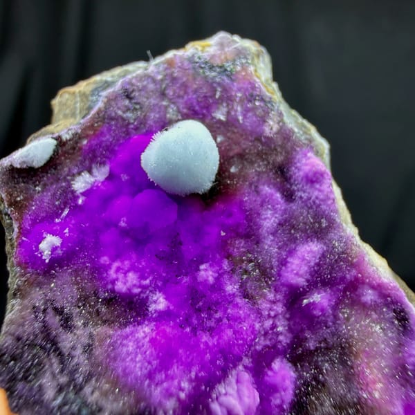 Vivid violet aragonite with blue aragonite ball from Yunnan, China, reverse side