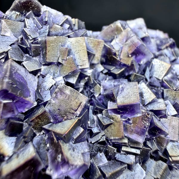 Plate of iridescent purple fluorite cubes with rainbow sheen from Inner Mongolia, China, second angle