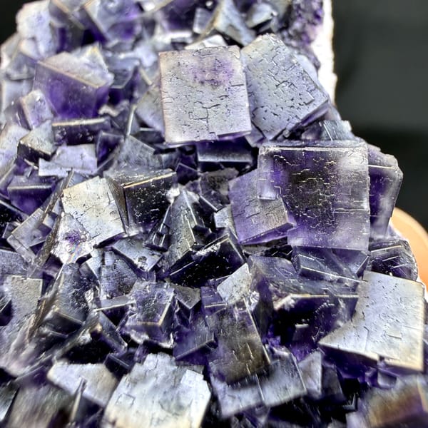 Plate of iridescent purple fluorite cubes with rainbow sheen from Inner Mongolia, China, top view