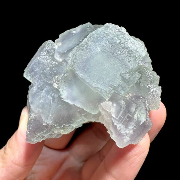 Window-faced stepped fluorite cluster with purple zoning from Guangxi, China, second angle