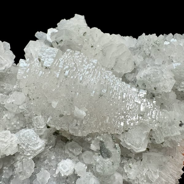 Floater of stepped white calcite with quartz from Guangdong, China, reverse side