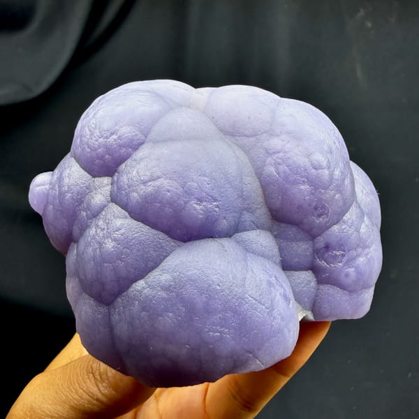 Lavender botryoidal agate mass with purple fluorite from Henan, China, close-up of the crystal faces