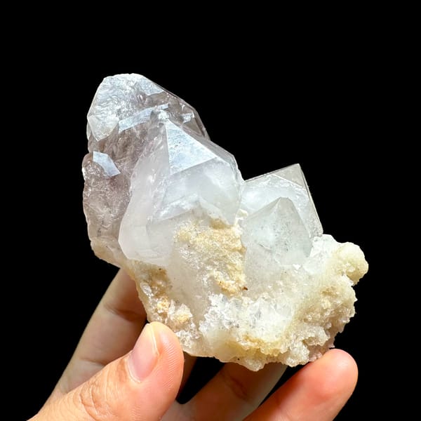 Pale purple and white cathedral quartz group from Brazil, top view