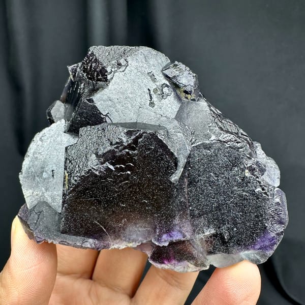Deep purple phantom fluorite glowing when, from Inner Mongolia, China, reverse side