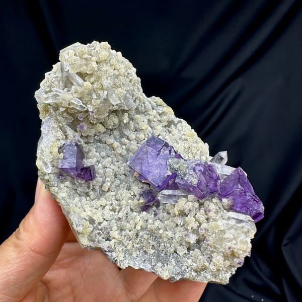 Deep purple fluorite cubes on tan quartz and mica from Yaogangxian Mine, Hunan, China, second angle