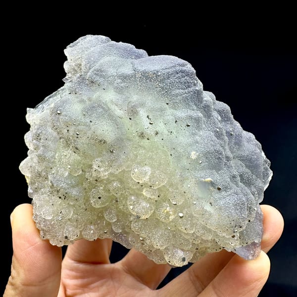 Frosted purple-green fluorite balls dusted with pyrite from Jiangxi, China, second angle