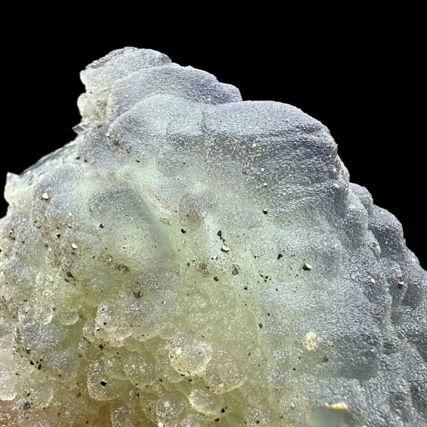 Frosted purple-green fluorite balls dusted with pyrite from Jiangxi, China, reverse side