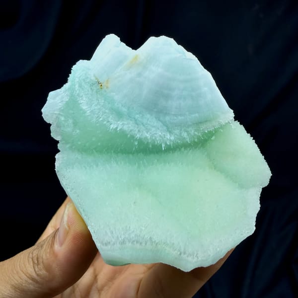 Smooth aqua-green acicular aragonite plate from Yunnan, China, reverse side