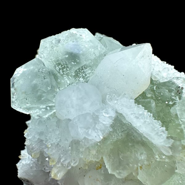 Plate of pale green fluorite cubes with inclusions on white quartz from Guangdong, China, second angle