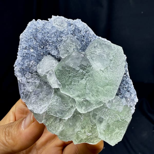 Pale green fluorite cubes in lavender quartz-druse pocket from Fujian, China, top view