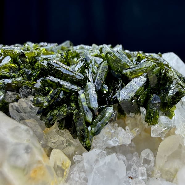 Dark green epidote thicket beside clear quartz points from Sichuan, China, top view