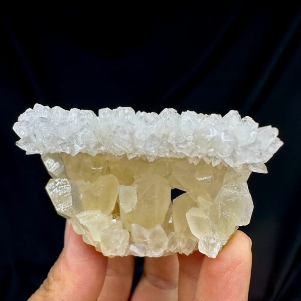 Heart-shaped hollow calcite cluster from Yunnan, China, close-up of the crystal faces