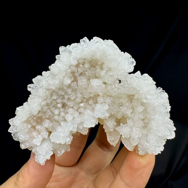 Heart-shaped hollow calcite cluster from Yunnan, China, reverse side