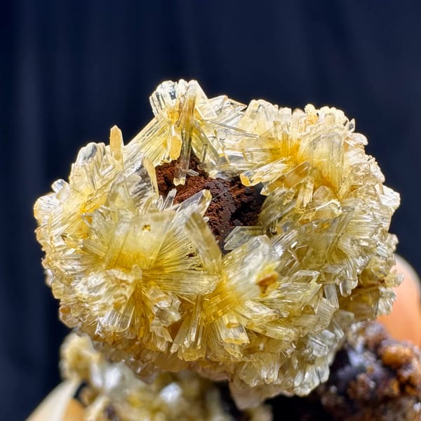 Fluorite cubes wrapped in golden jarosite from Guizhou, China, close-up of the crystal faces