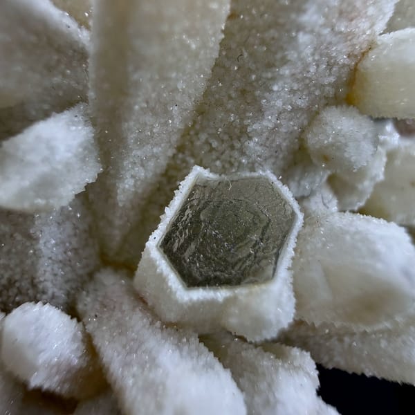 Sugar-textured pale quartz needles in spiky cluster from Guangdong, China, top view