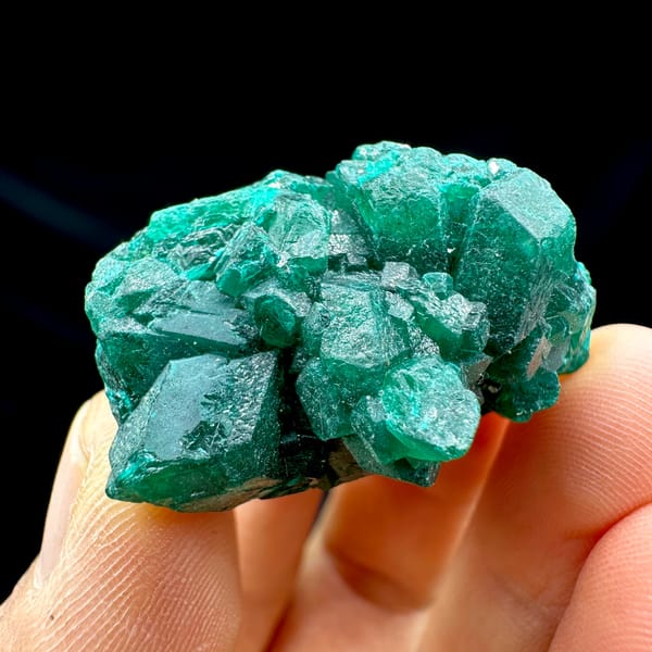 Cluster of emerald-green dioptase crystals from DR Congo, second angle