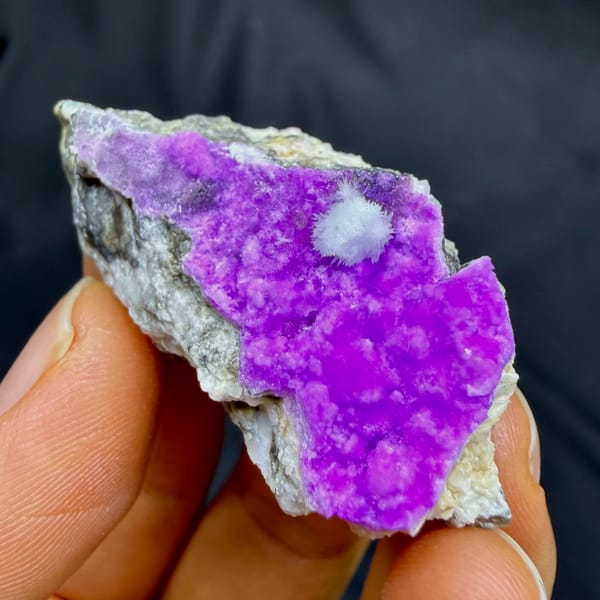Vivid magenta aragonite with white aragonite tuft from Yunnan, China, second angle