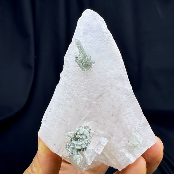 Calcite crystal with green phantom quartz, from Guangdong, China, close-up of the crystal faces