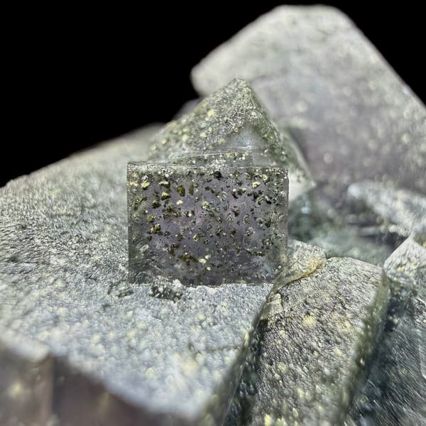 Blue-green daylight fluorite cubes enclosing pyrite from Nigeria, reverse side