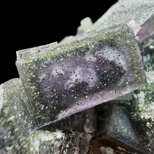Blue-green daylight fluorite cubes enclosing pyrite from Nigeria, top view