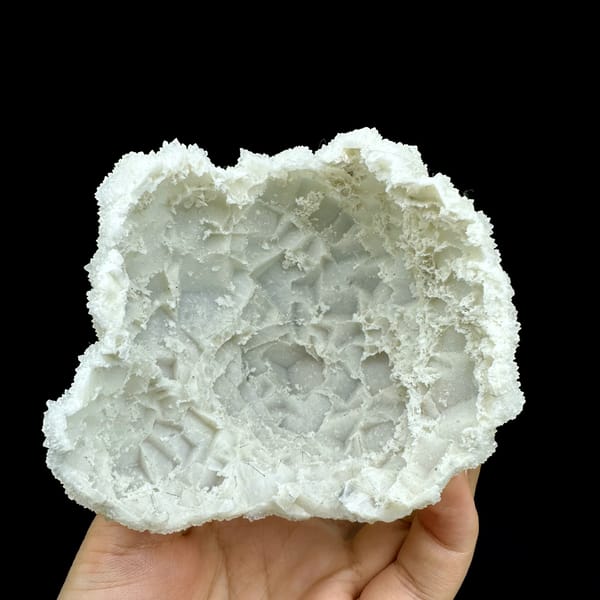 Hollow-shell quartz mass of sparkling white druse from Fujian, China, second angle