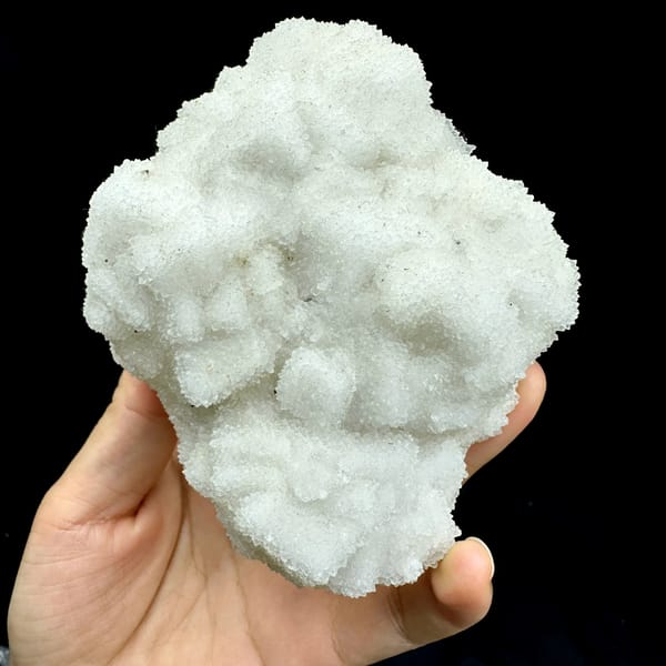 Hollow-shell quartz mass of sparkling white druse from Fujian, China, top view