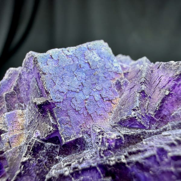 Iridescent purple fluorite with rainbow sheen from Inner Mongolia, China, reverse side