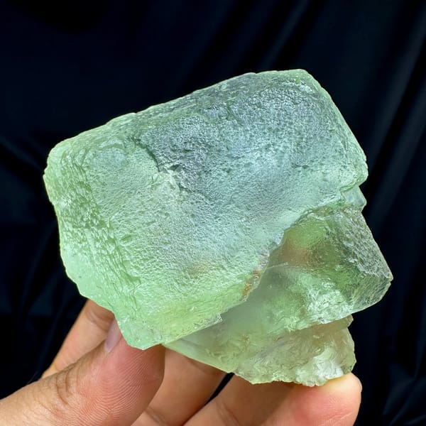 Single large translucent green fluorite cube from Fujian, China, second angle
