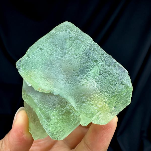Single large translucent green fluorite cube from Fujian, China, top view