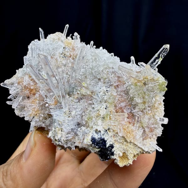 Clear quartz needles bristling over pale base from Guangdong, China, second angle