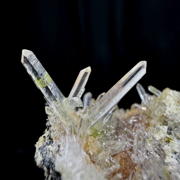 Clear quartz needles bristling over pale base from Guangdong, China, top view