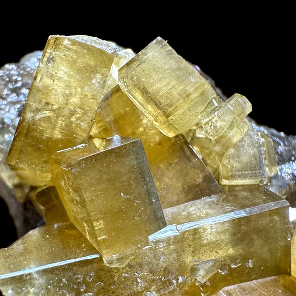Golden baryte blades on grey base with purple fluorite from Jiangxi, China, reverse side
