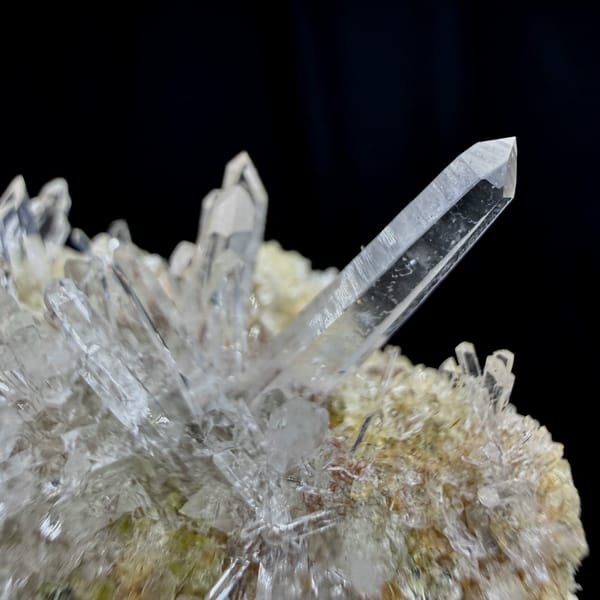 Sunburst of clear quartz needles from Guangdong, China, reverse side
