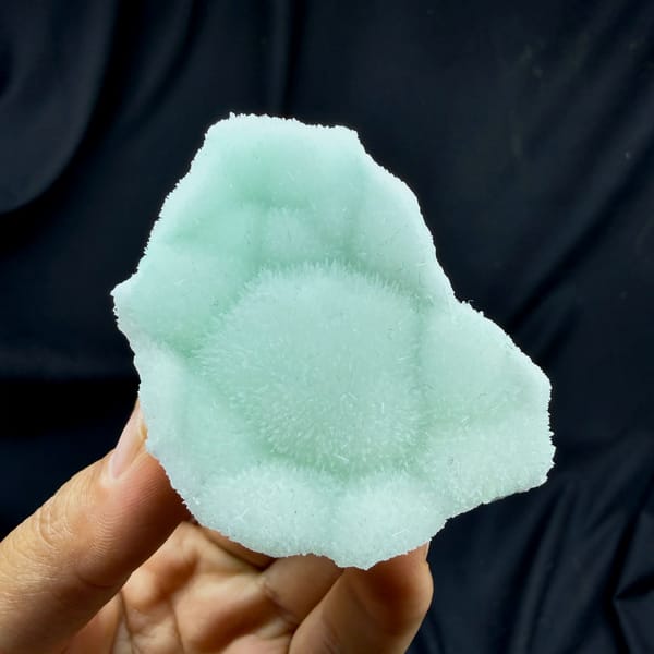 Soft aqua-green aragonite plate with radiating centre from Yunnan, China, second angle
