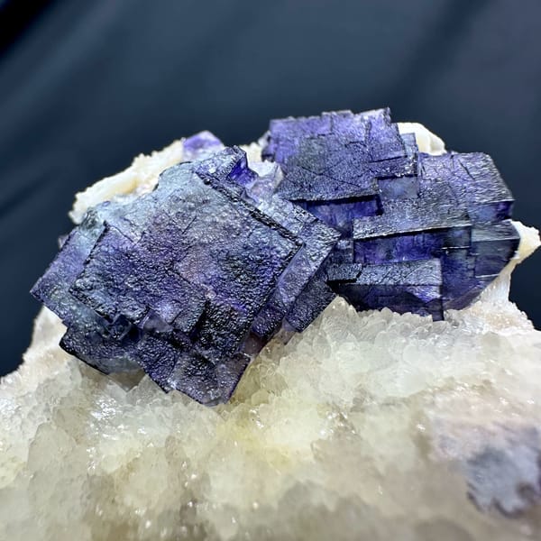 Purple-edged fluorite cubes on white quartz druse from Inner Mongolia, China, second angle