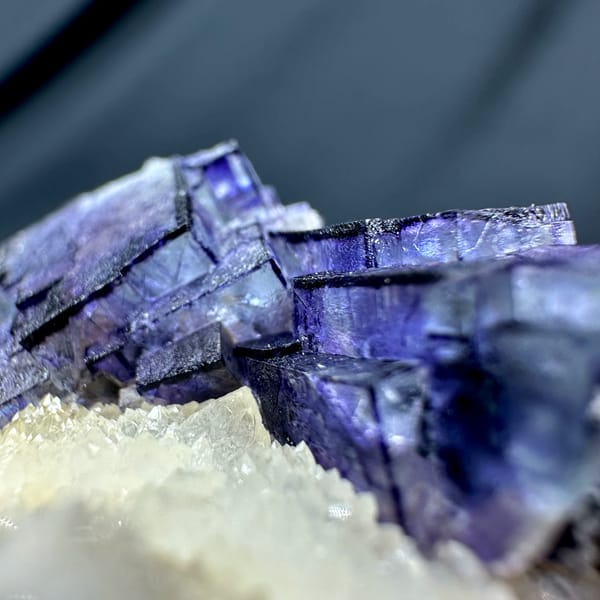 Purple-edged fluorite cubes on white quartz druse from Inner Mongolia, China, top view