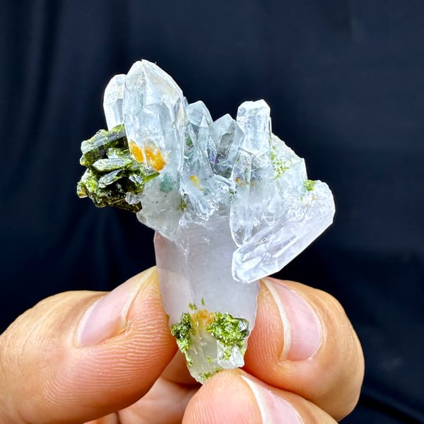 Clear quartz spire with dark green epidote from Sichuan, China, second angle