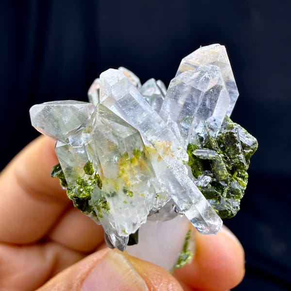 Clear quartz spire with dark green epidote from Sichuan, China, top view