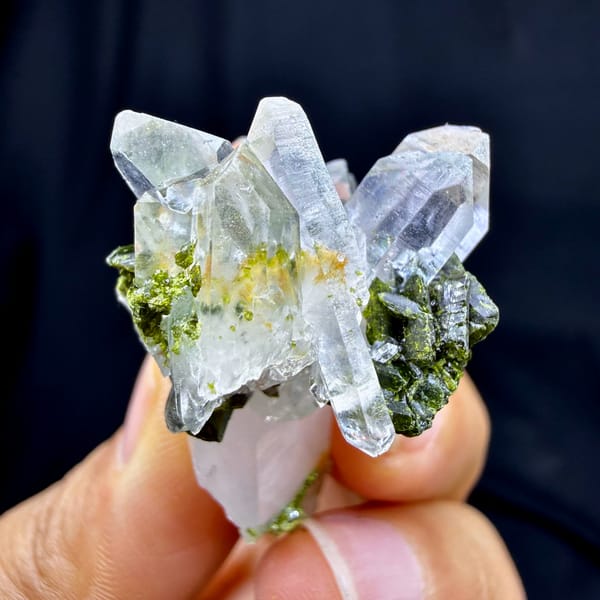 Clear quartz spire with dark green epidote from Sichuan, China, side view