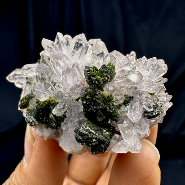 Rounded cluster of sparkling clear quartz with epidote from Sichuan, China, second angle