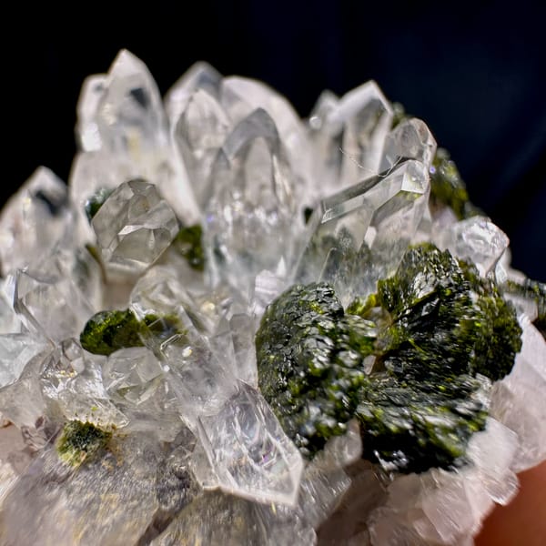 Rounded cluster of sparkling clear quartz with epidote from Sichuan, China, reverse side
