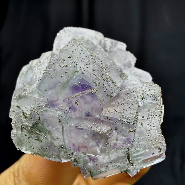 Purple-cored fluorite cubes dusted with pyrite from Yaogangxian Mine, Hunan, China