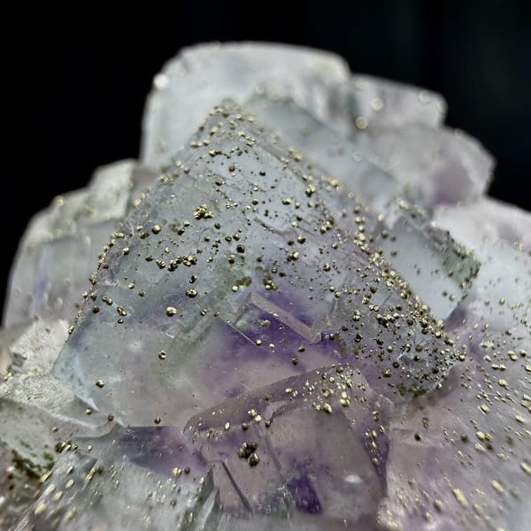 Purple-cored fluorite cubes dusted with pyrite from Yaogangxian Mine, Hunan, China, top view